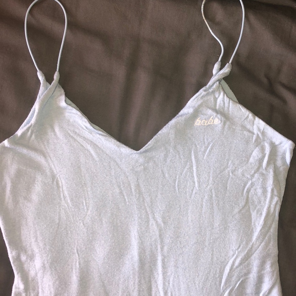 light blue body suit